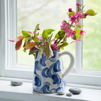 Swans Island Company's Terracotta fan Jug - Handmade in Portugal. Shown here in Blue and white fan pattern.