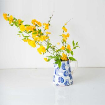 Swans Island Company's Terracotta fan Jug - Handmade in Portugal. Shown here in Blue fan pattern.