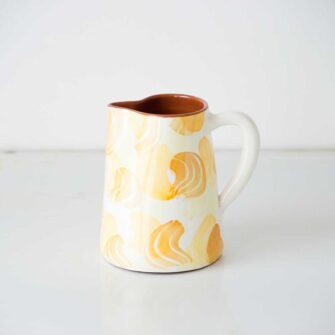 Swans Island Company's Terracotta fan Jug - Handmade in Portugal. Shown here in Tangerine Yellow fan pattern.