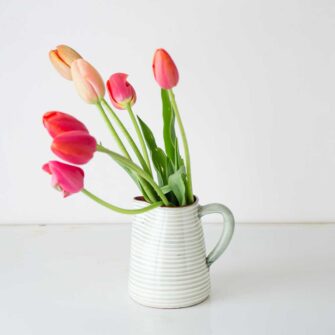 Swans Island Company's Striped Terracotta Pitcher - Handmade in Portugal. Shown here in Sage and White.