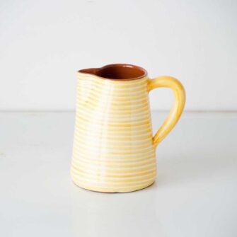 Swans Island Company's Striped Terracotta Pitcher - Handmade in Portugal. Shown here in Tangerine Yellow and White.