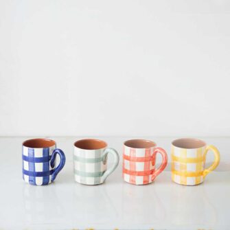 Plaid Terracotta Mug. Handcrafted in Portugal. Shown here in Blue, Sage, Terra Cotta and Tangerine Yellow.