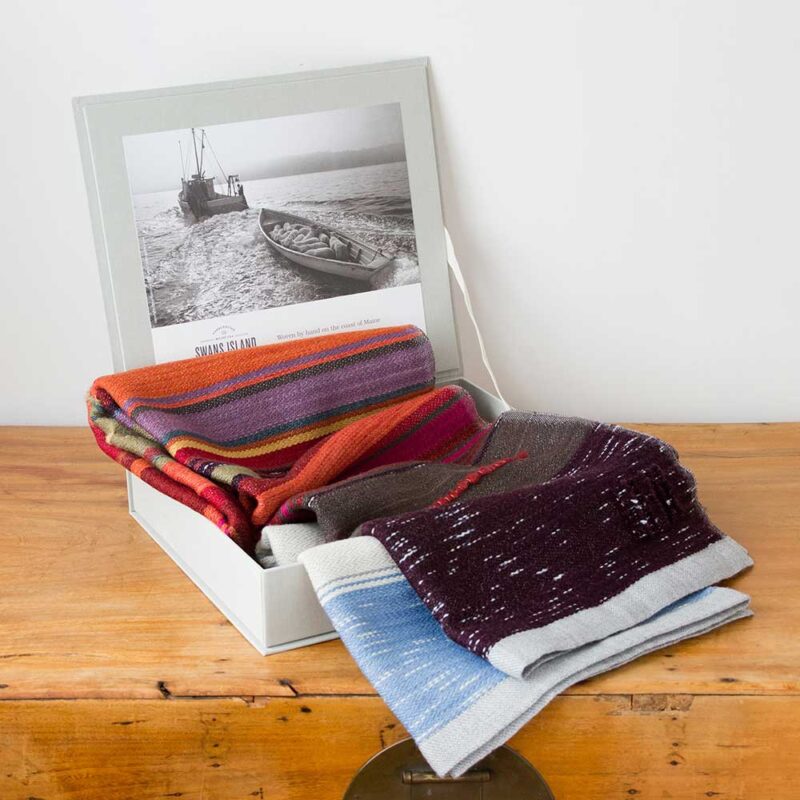 Swans Island Company's 2025 Limited Edition "Autumn in New England" Throw commemorates Yankee Magazines' 90th anniversary. This handwoven throw features 90 color changes in vibrant autumn hues of hand-dyed color. Made in Maine. Limited supply. Each throw comes in this beautiful presentation gift box.
