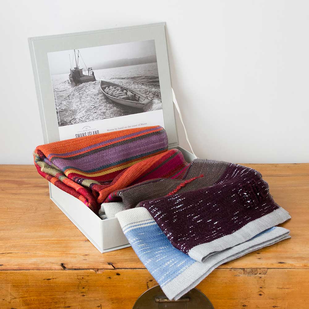 Swans Island Company's 2025 Limited Edition "Autumn in New England" Throw commemorates Yankee Magazines' 90th anniversary. This handwoven throw features 90 color changes in vibrant autumn hues of hand-dyed color. Made in Maine. Limited supply. Each throw comes in this beautiful presentation gift box.